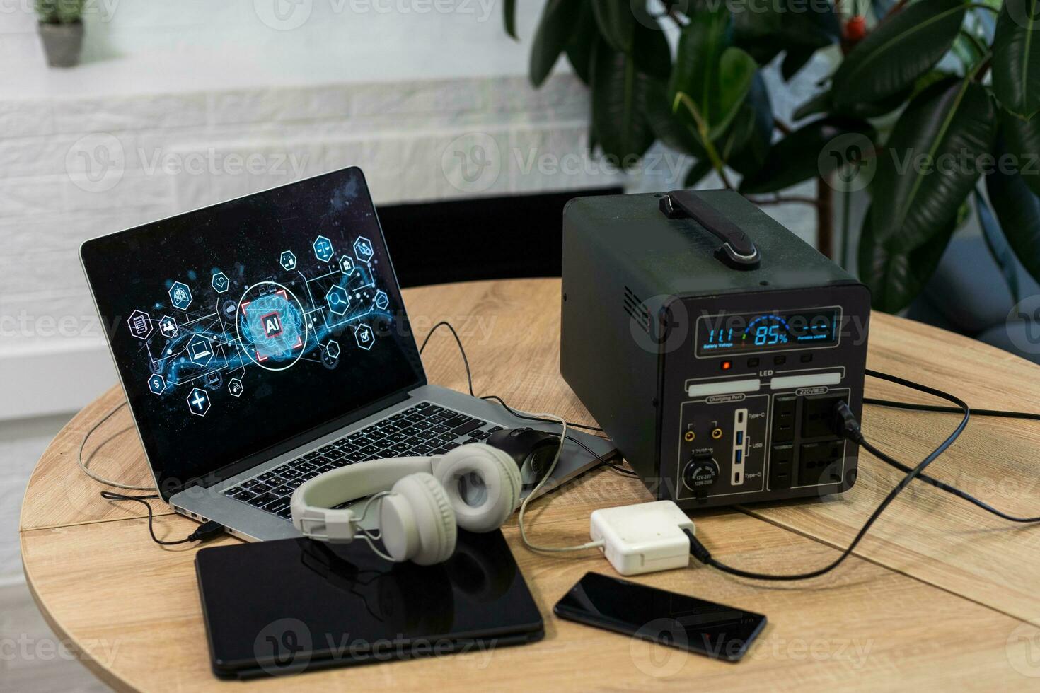 Portable power station solar electricity generator laptop, phone, tablet and digital camera electronic devices charging. Wireless charging battery backup, power outage emergencies outdoors, camping photo
