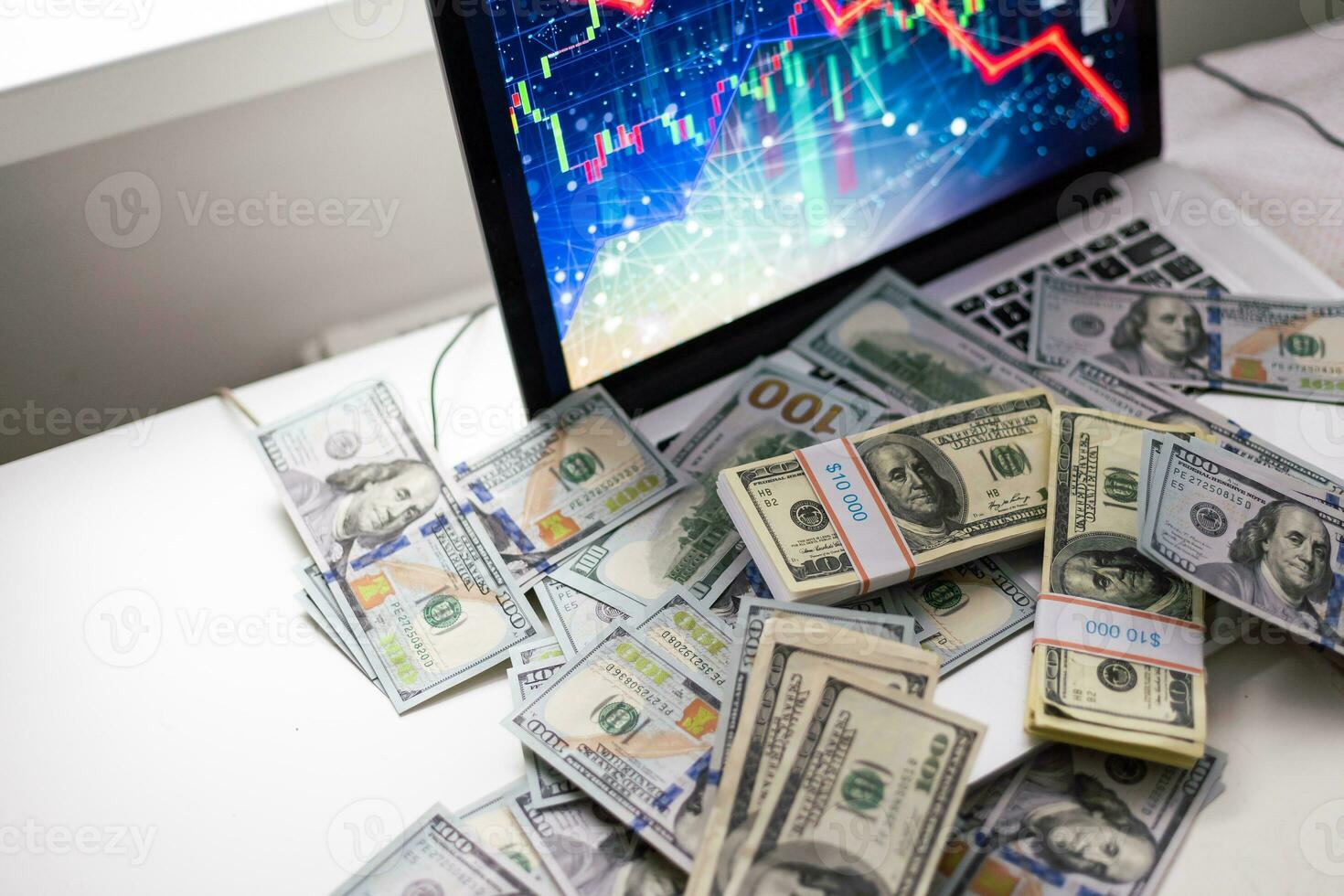 Closeup dollar banknote with screen stock exchange data graph background. Finance and business concept photo