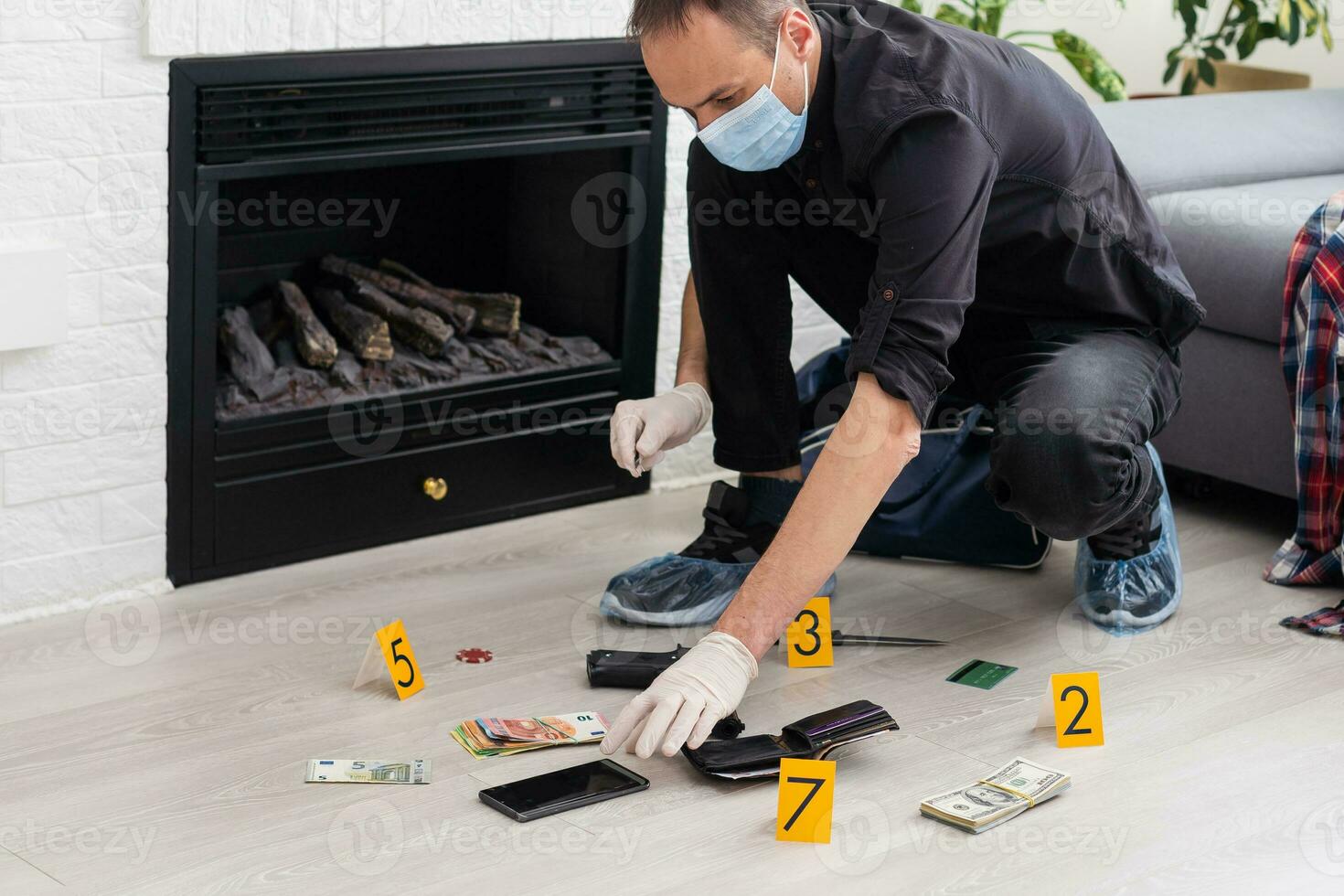 Forensics researcher photographing a blood at a murder scene photo