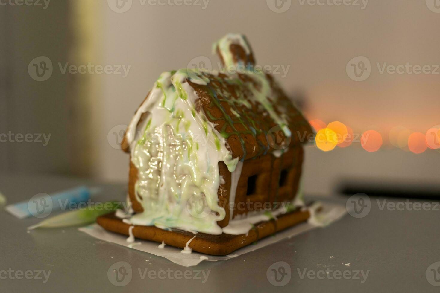 Christmas homemade gingerbread house cookie photo