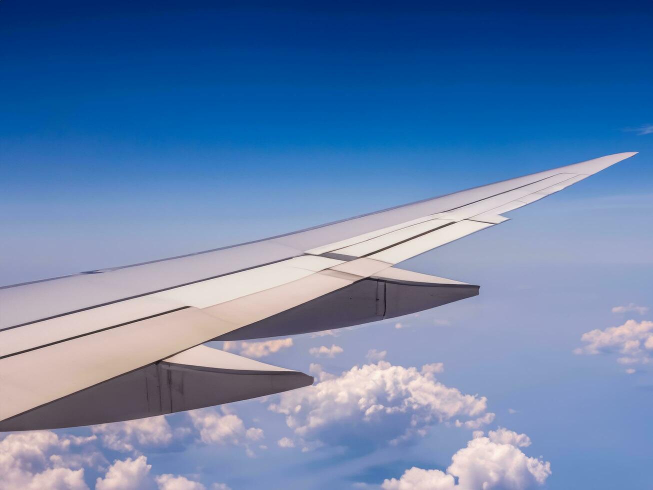 view from airplane with clouds and airplane wing AI Generative photo
