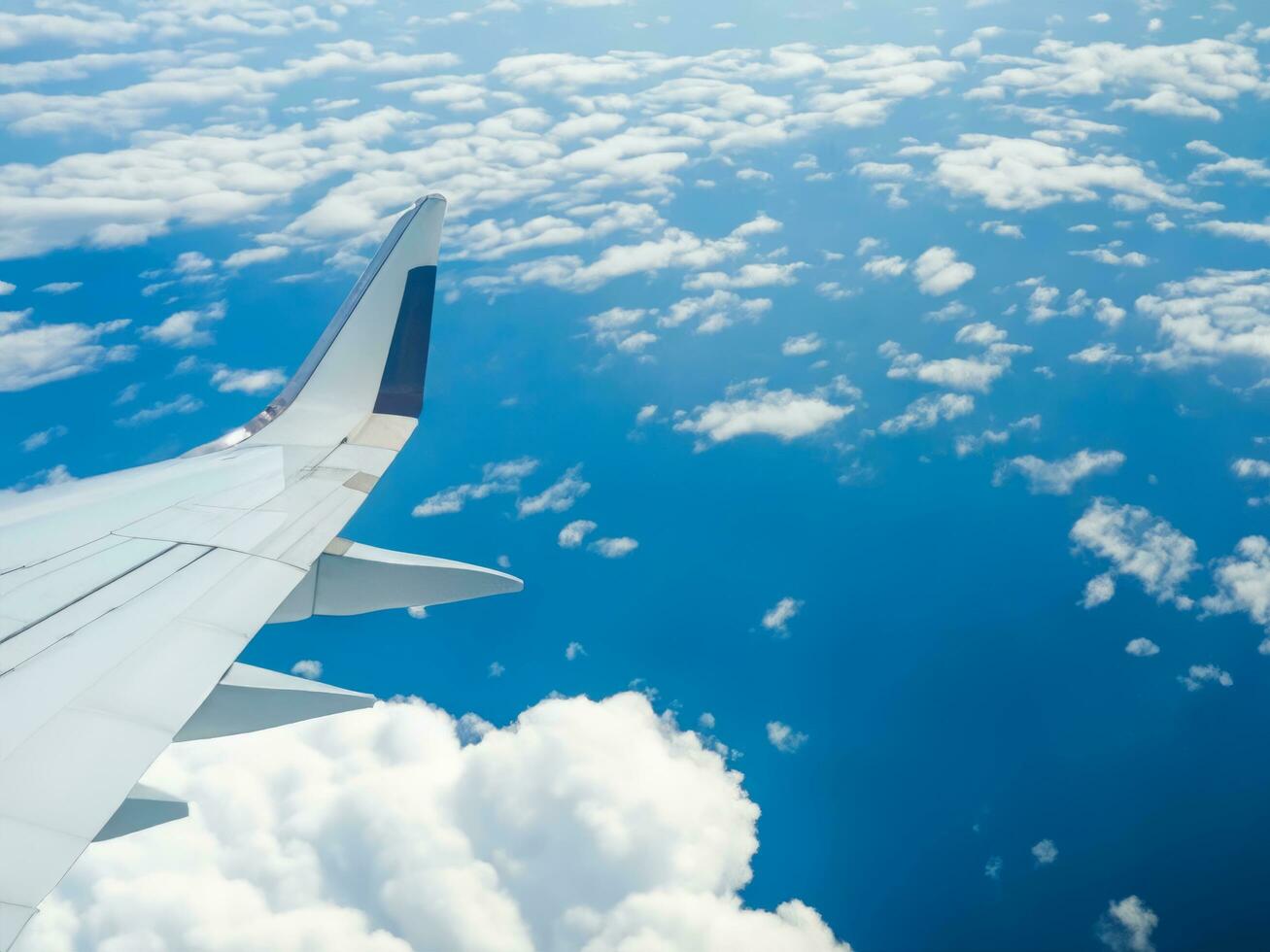view from airplane with clouds and airplane wing AI Generative photo