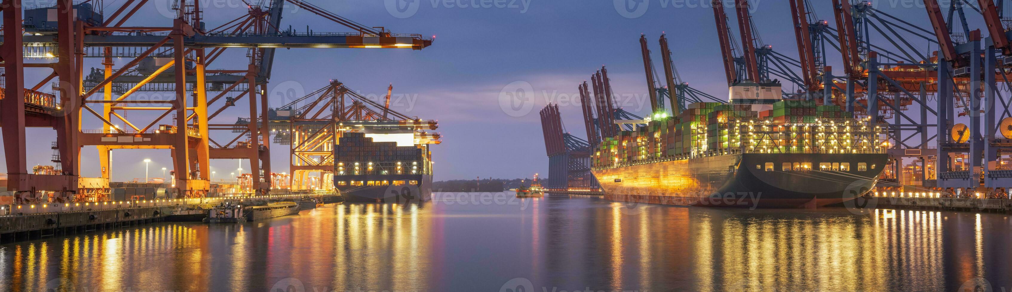 Container terminal in the evening in hamburg harbor photo