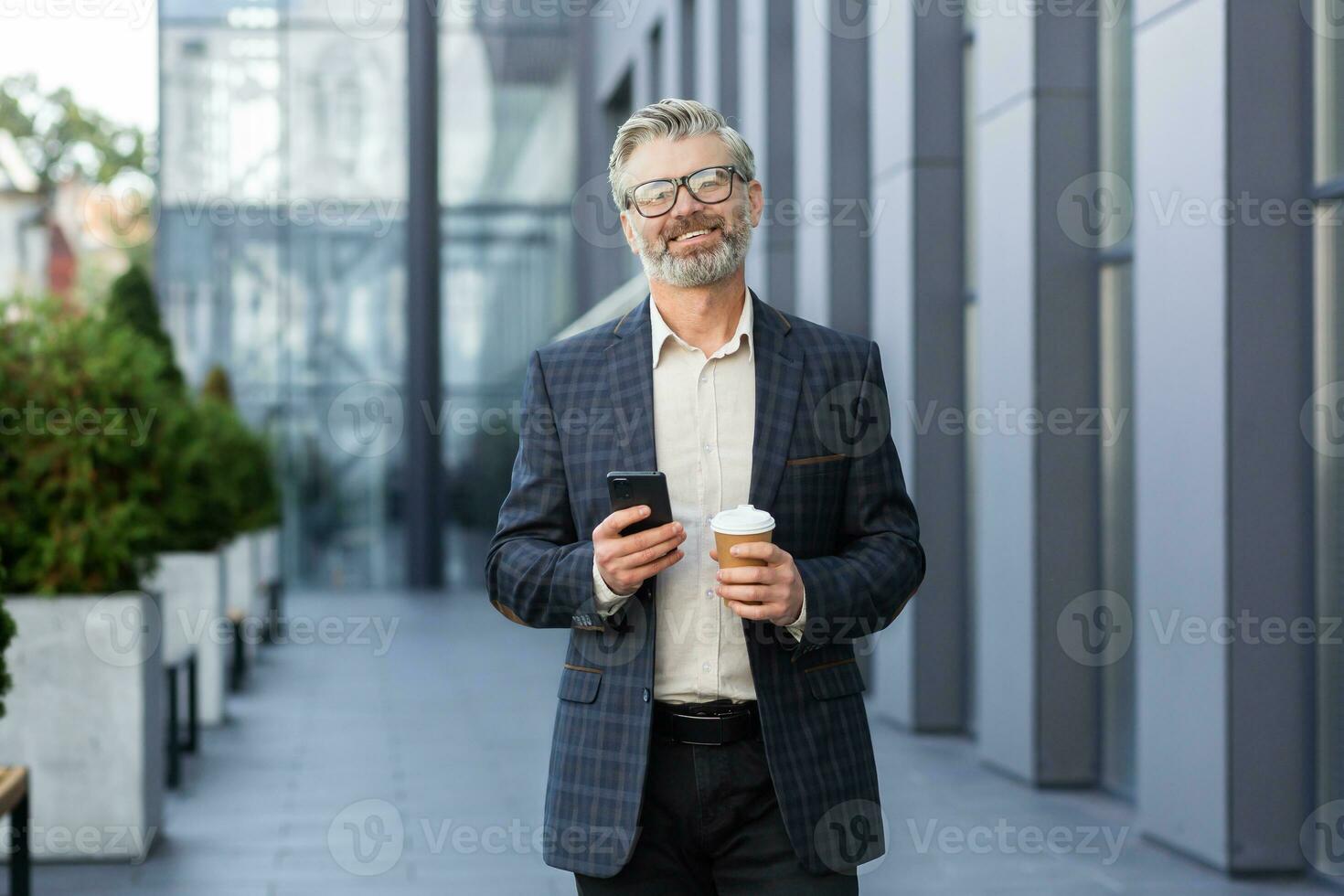 Portrait of an older male businessman walking down the street