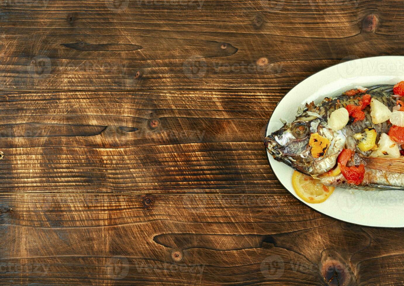 Roasted whole tilapia or Mujair. photo