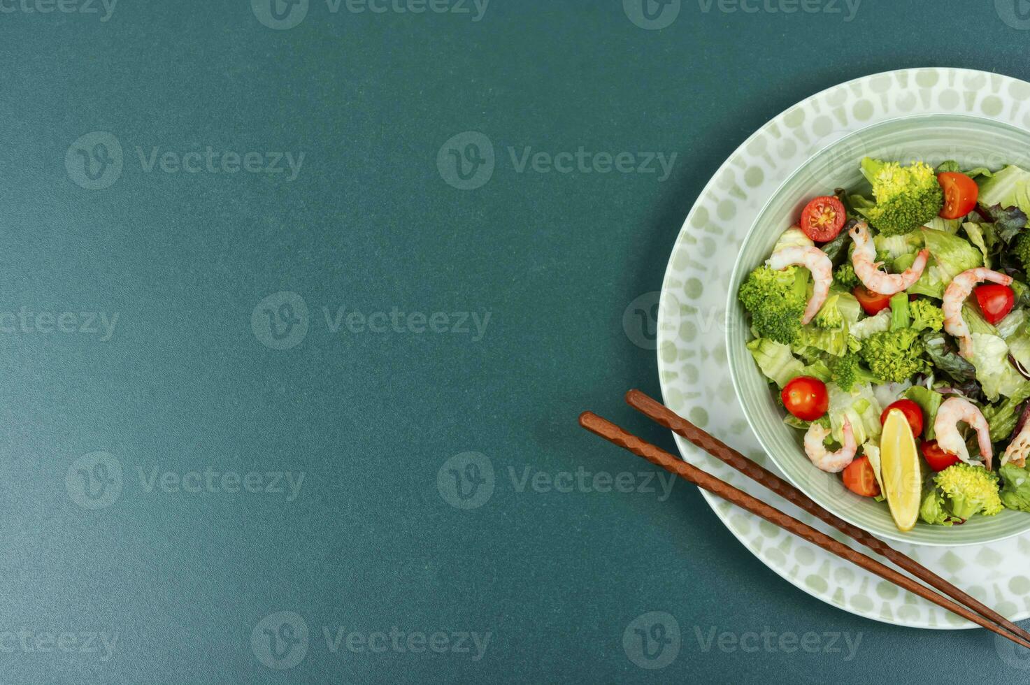 Salad with broccoli and shrimp, Asian food. photo