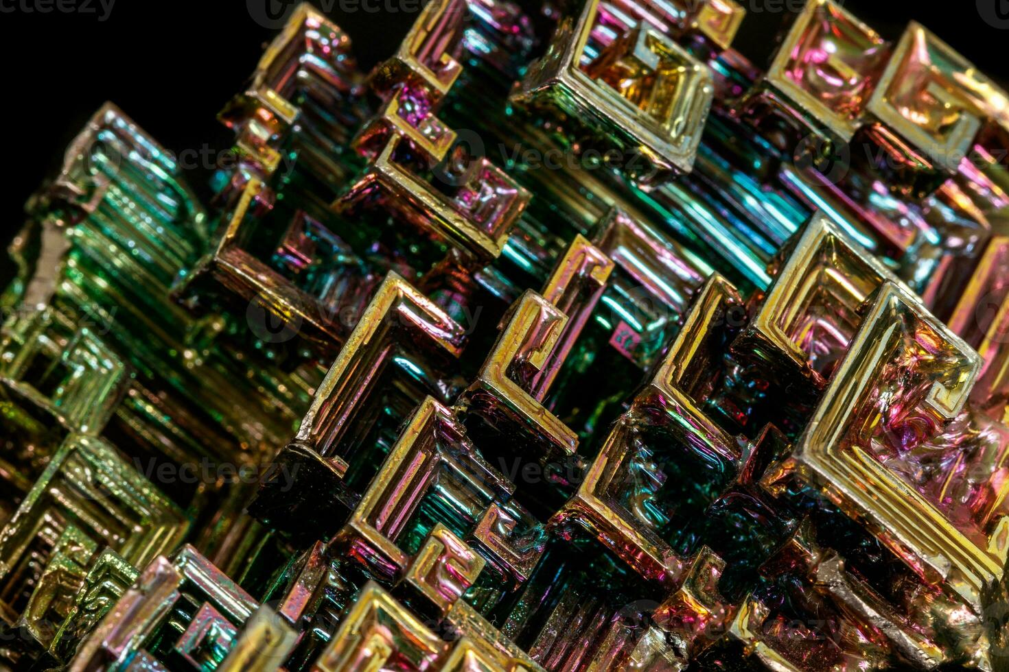 Macro of the stone bismuth mineral on a black background photo