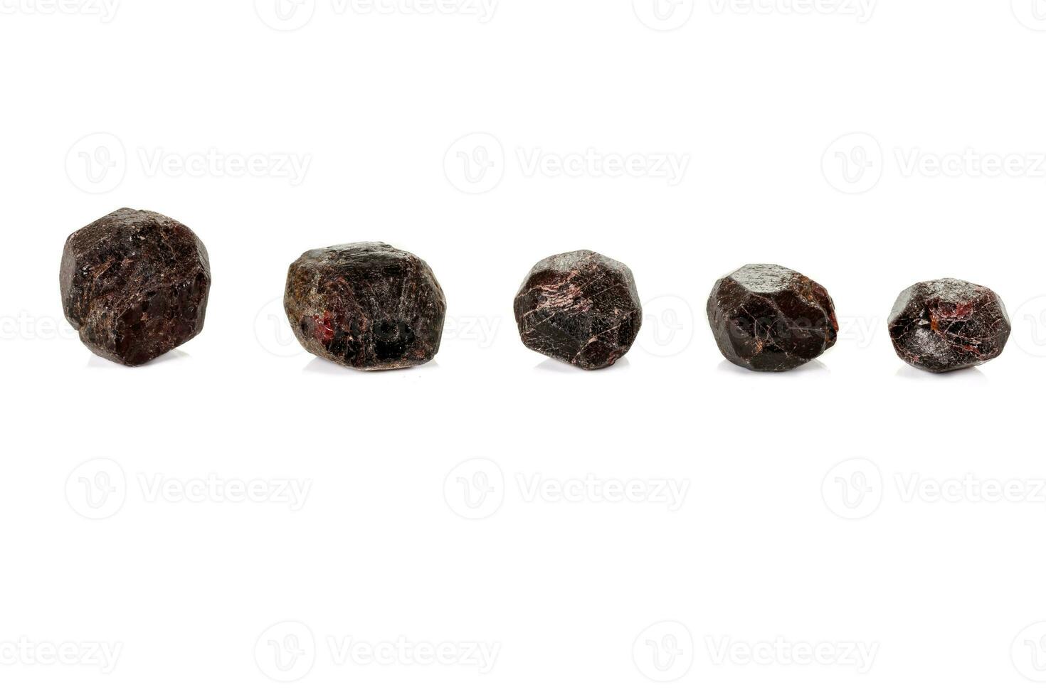 macro mineral stone  Garnet, on a white background photo