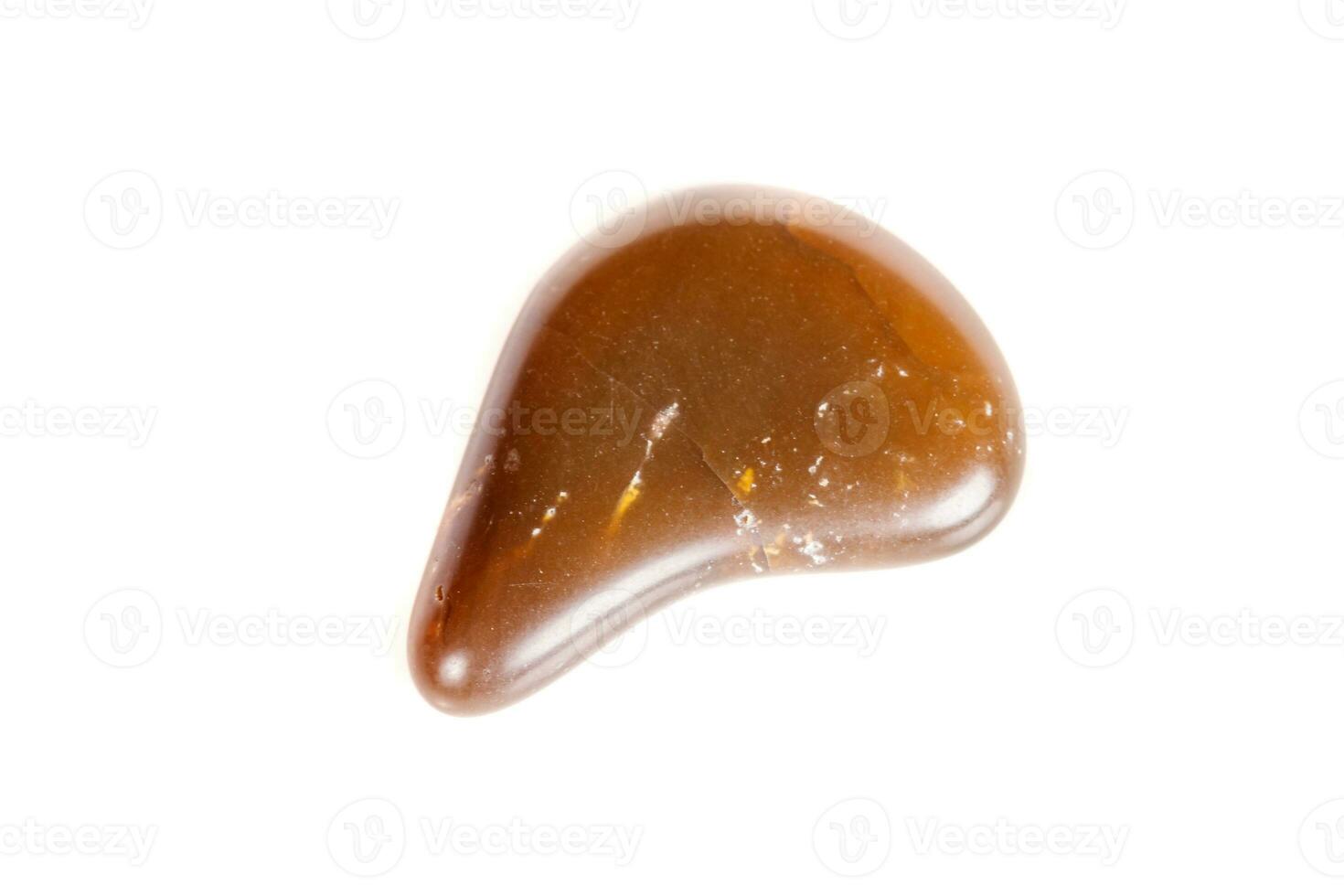 Macro mineral stone Carnelian on white background photo
