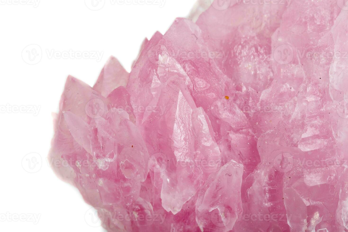 Macro mineral stone Rose quartz on white background photo