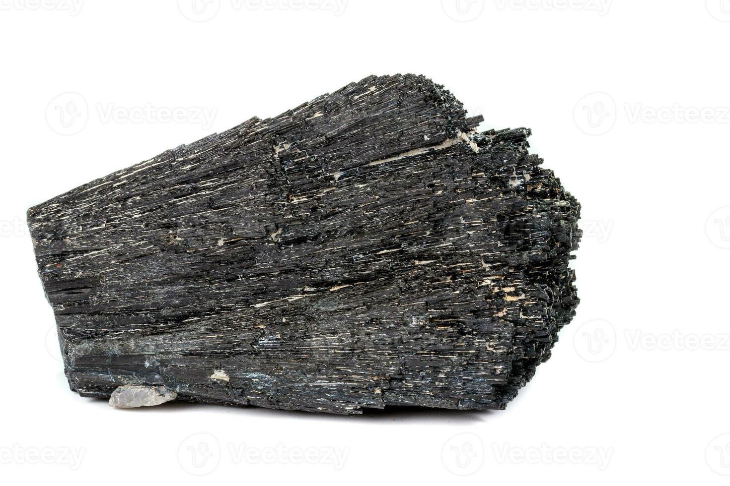 Macro mineral stone Schorl, Black Tourmaline on a white background photo