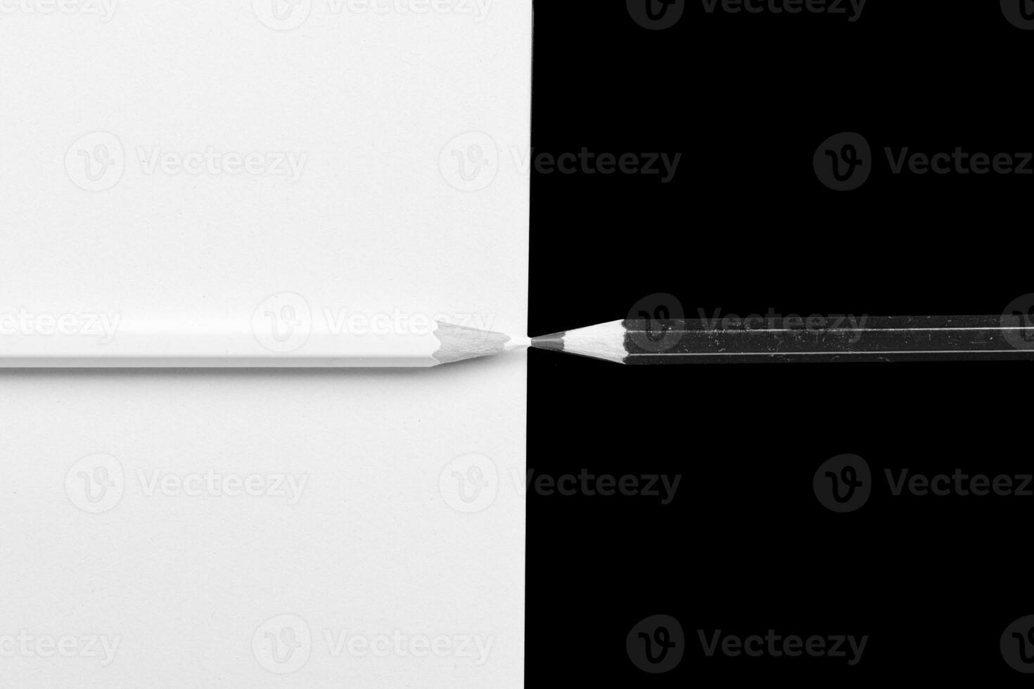 white and black pencil on white and black background photo