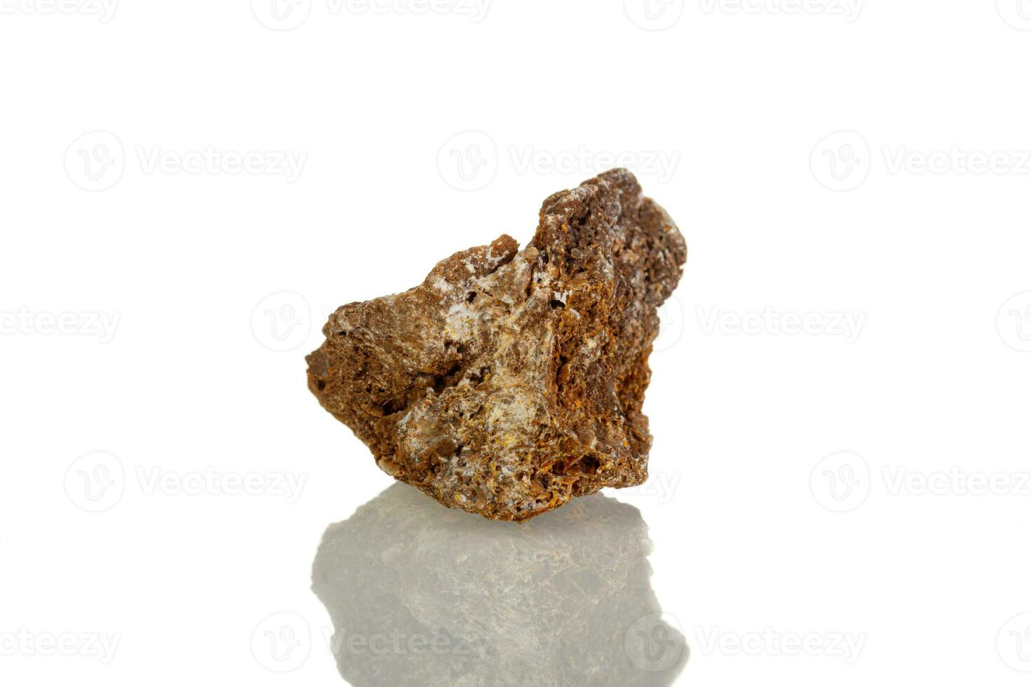 macro mineral stone Wulfenite on a white background photo