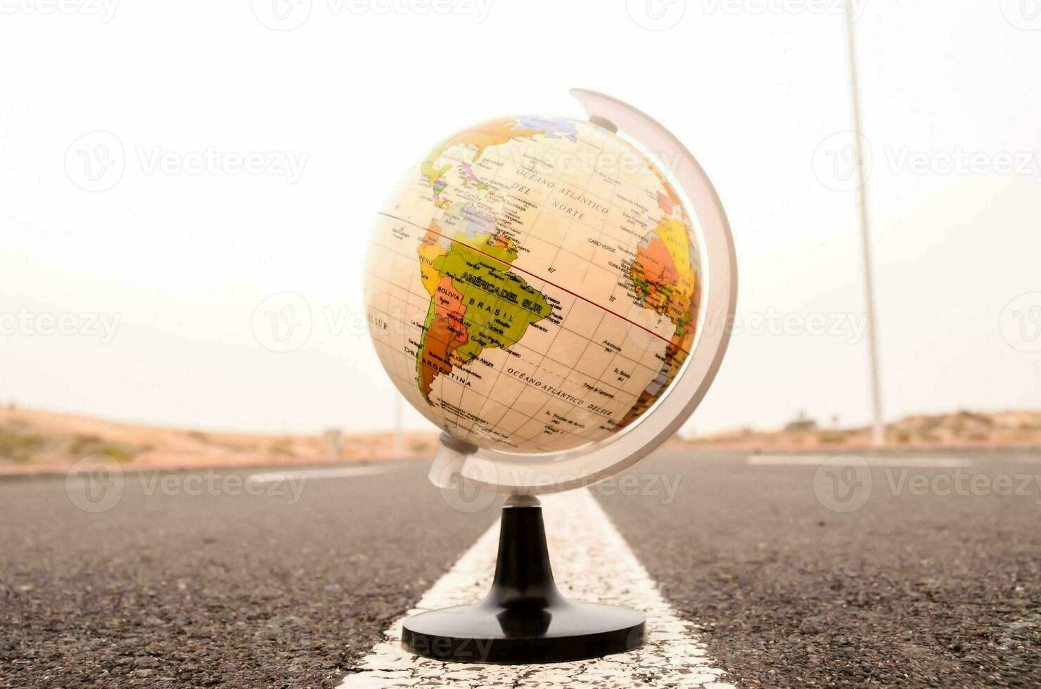 a globe on the road photo
