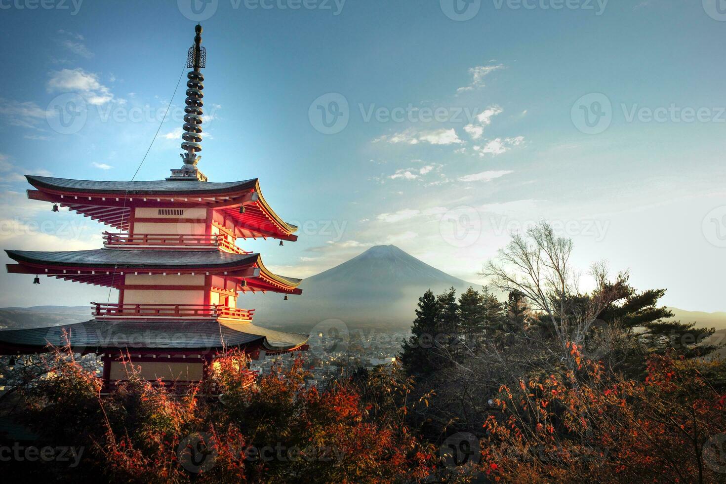 Landscape of old Japanese temple with the autumn leaves tree photo