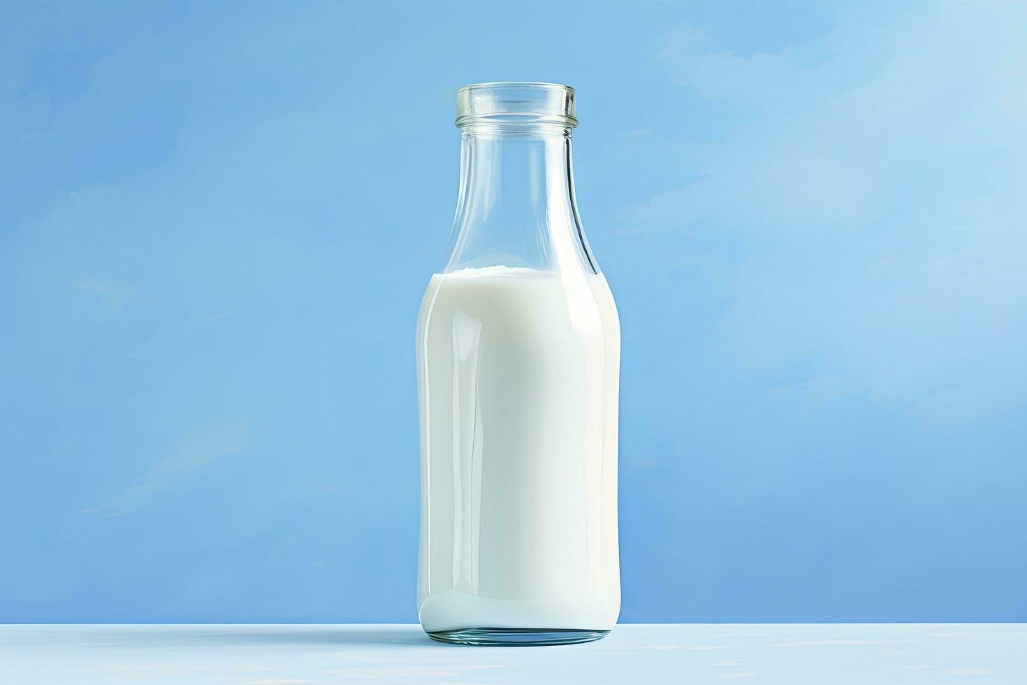 AI generated A glass bottle with full milk on blue background. photo