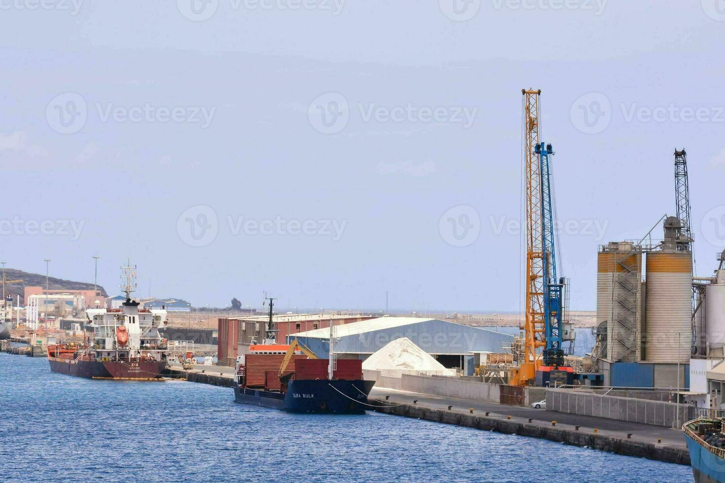 a large port with several ships docked in it photo