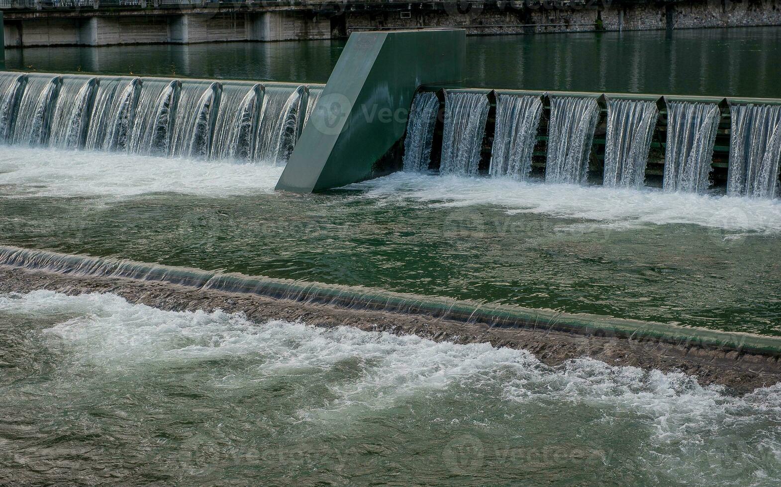 Water overflowing from the dam photo