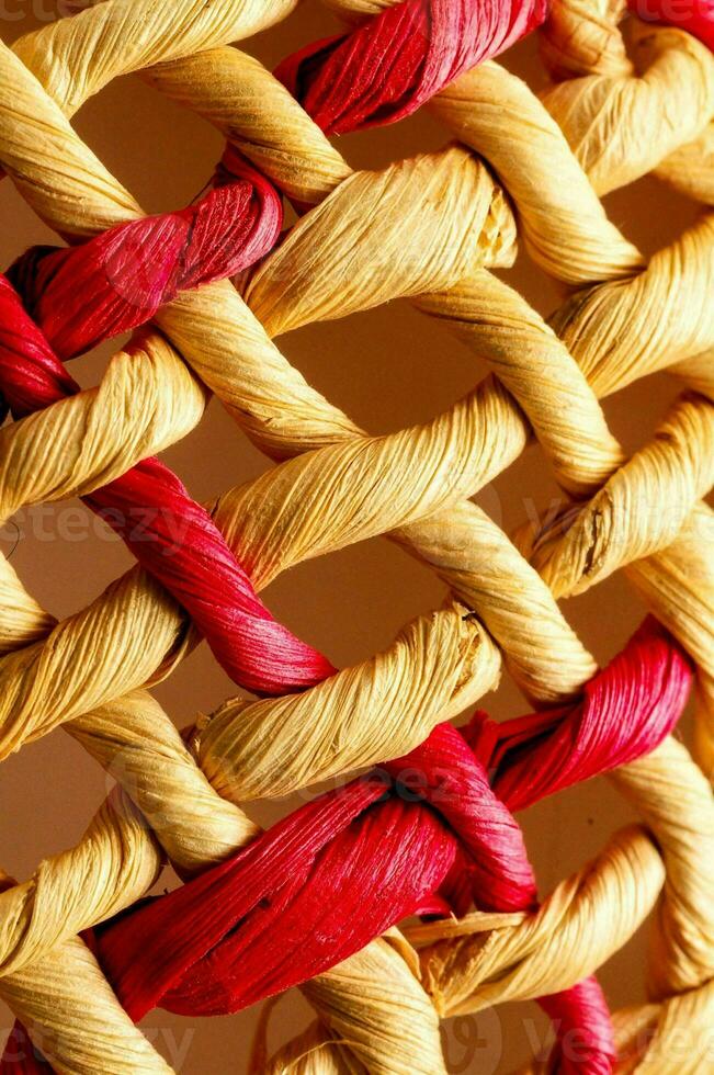 close up of a woven red and yellow basket photo