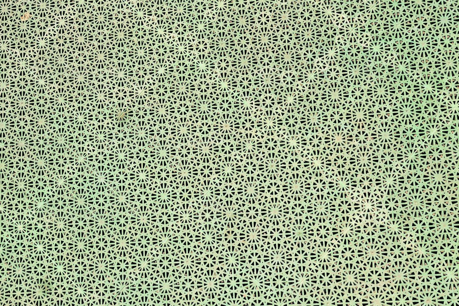 a green patterned background photo
