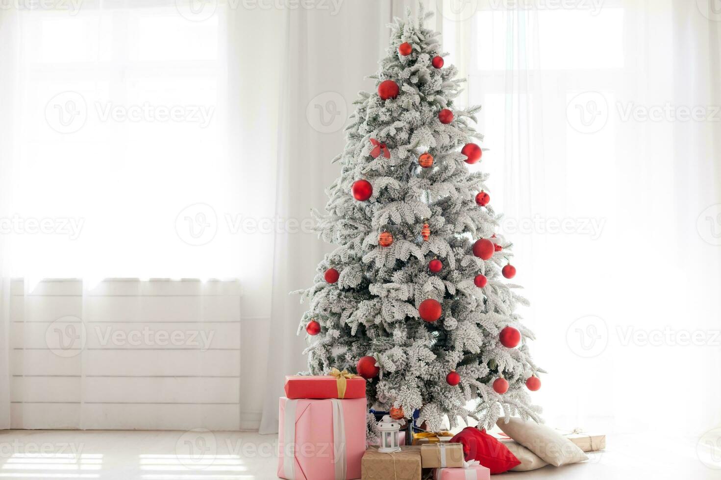 Christmas interior stock photos. Explore warm and inviting holiday themed home settings, adorned with twinkling lights, stockings, and beautifully decorated Christmas trees. photo