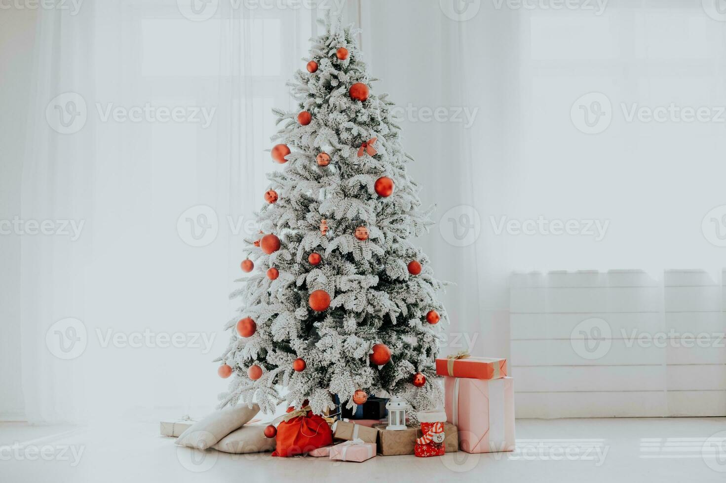 Christmas interior stock photos. Explore warm and inviting holiday themed home settings, adorned with twinkling lights, stockings, and beautifully decorated Christmas trees. photo