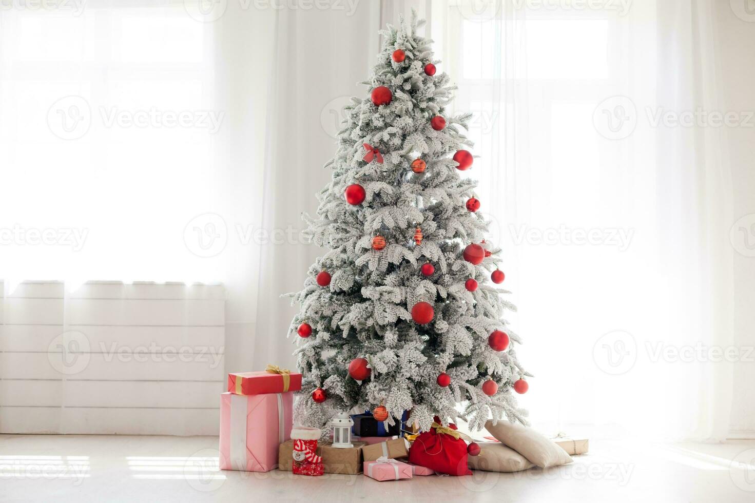 Christmas interior stock photos. Explore warm and inviting holiday themed home settings, adorned with twinkling lights, stockings, and beautifully decorated Christmas trees. photo