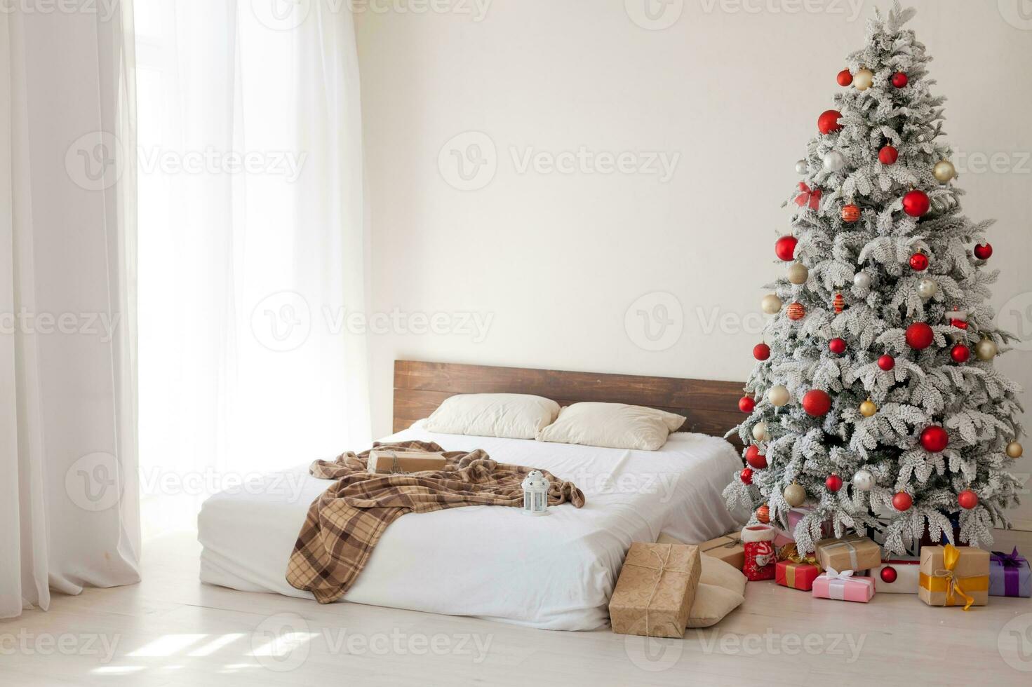 Christmas interior stock photos. Explore warm and inviting holiday themed home settings, adorned with twinkling lights, stockings, and beautifully decorated Christmas trees. photo