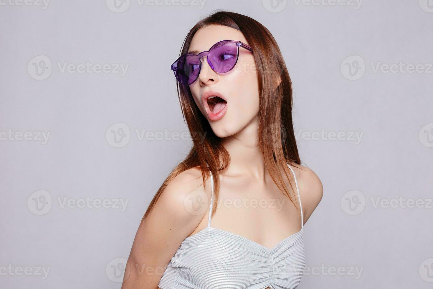 Portrait of beauty girl in eyeglasses on white background photo