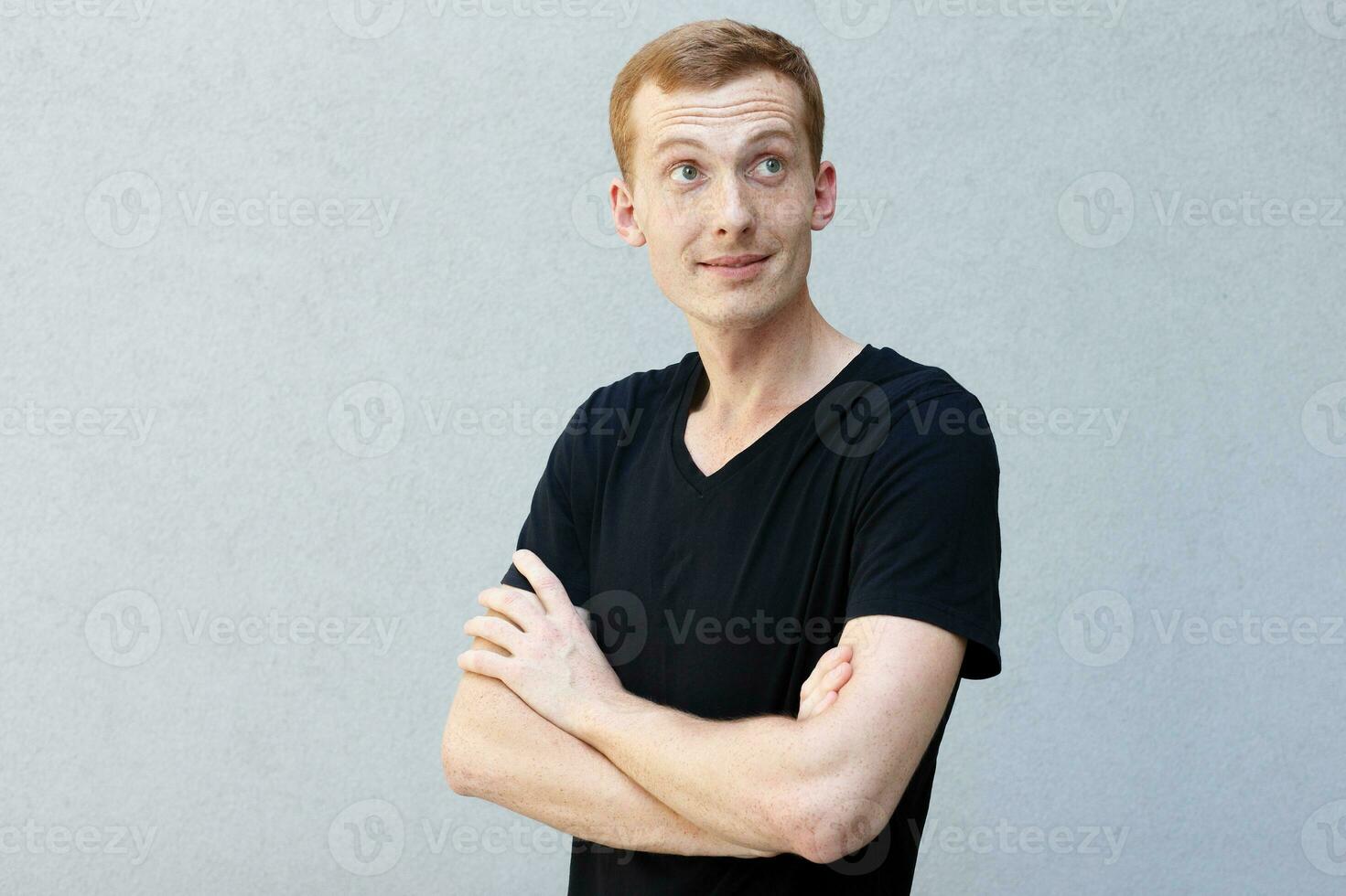 Close up portrait of a redhead of a beautiful manly guy with freckles photo
