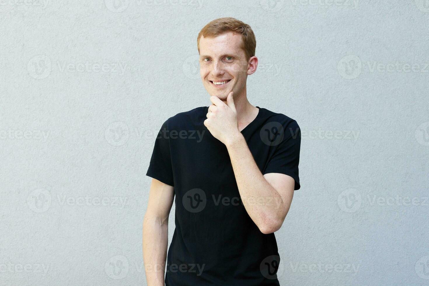 Close up portrait of a redhead of a beautiful manly guy with freckles photo