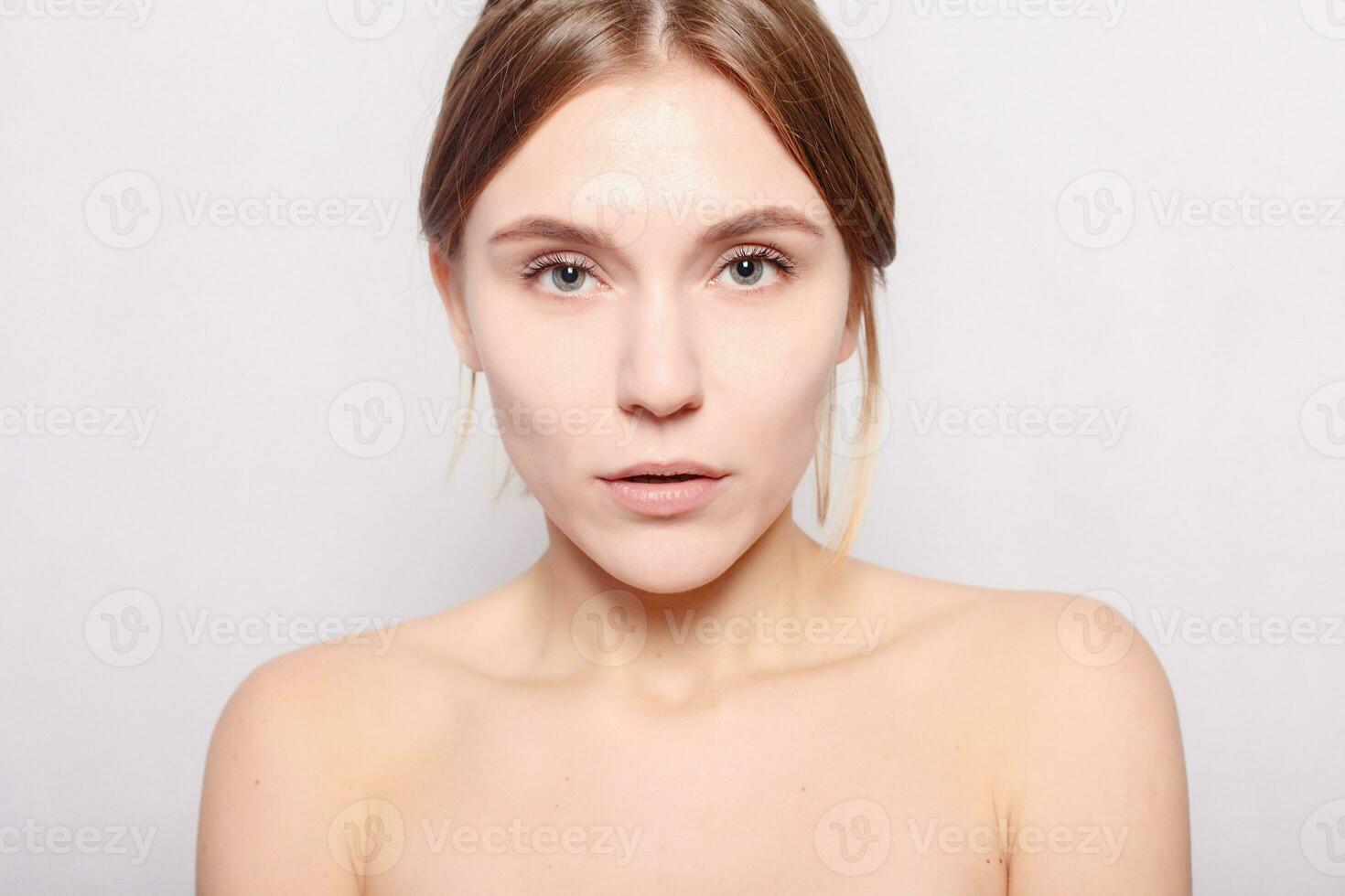 Spa Woman. Beautiful Girl After Bath Touching Her Face. photo