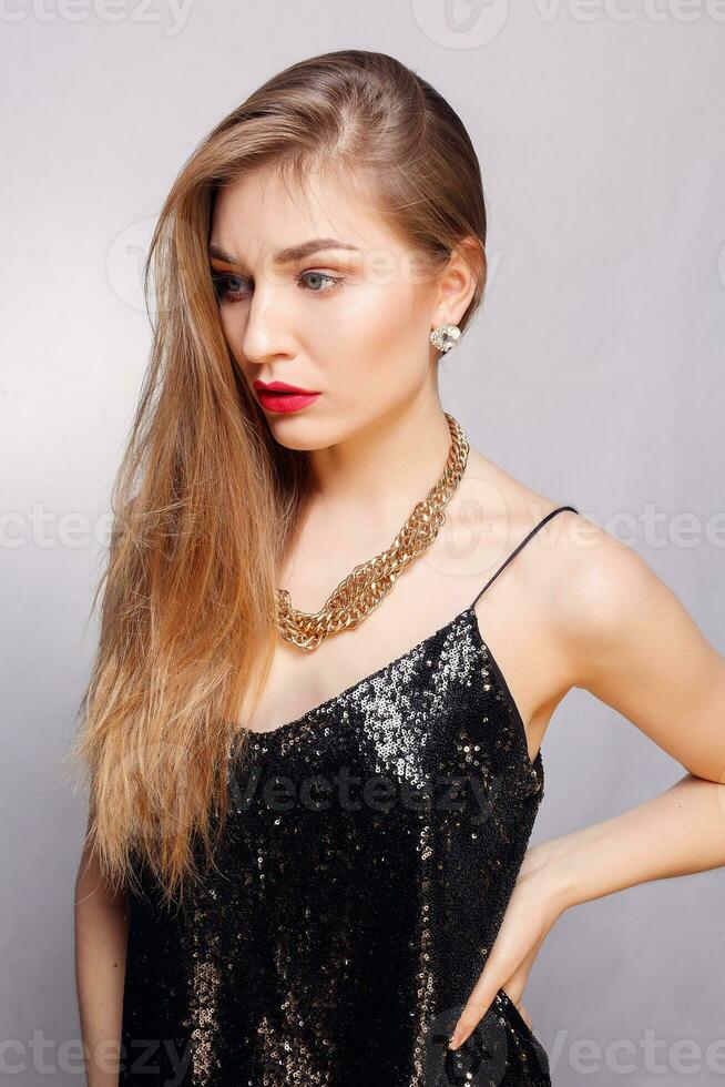 Gold earrings, ring and necklace. photo