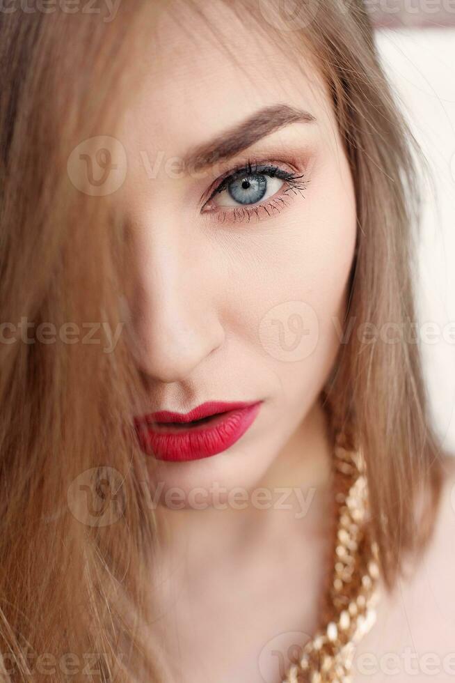 Gold earrings, ring and necklace. photo