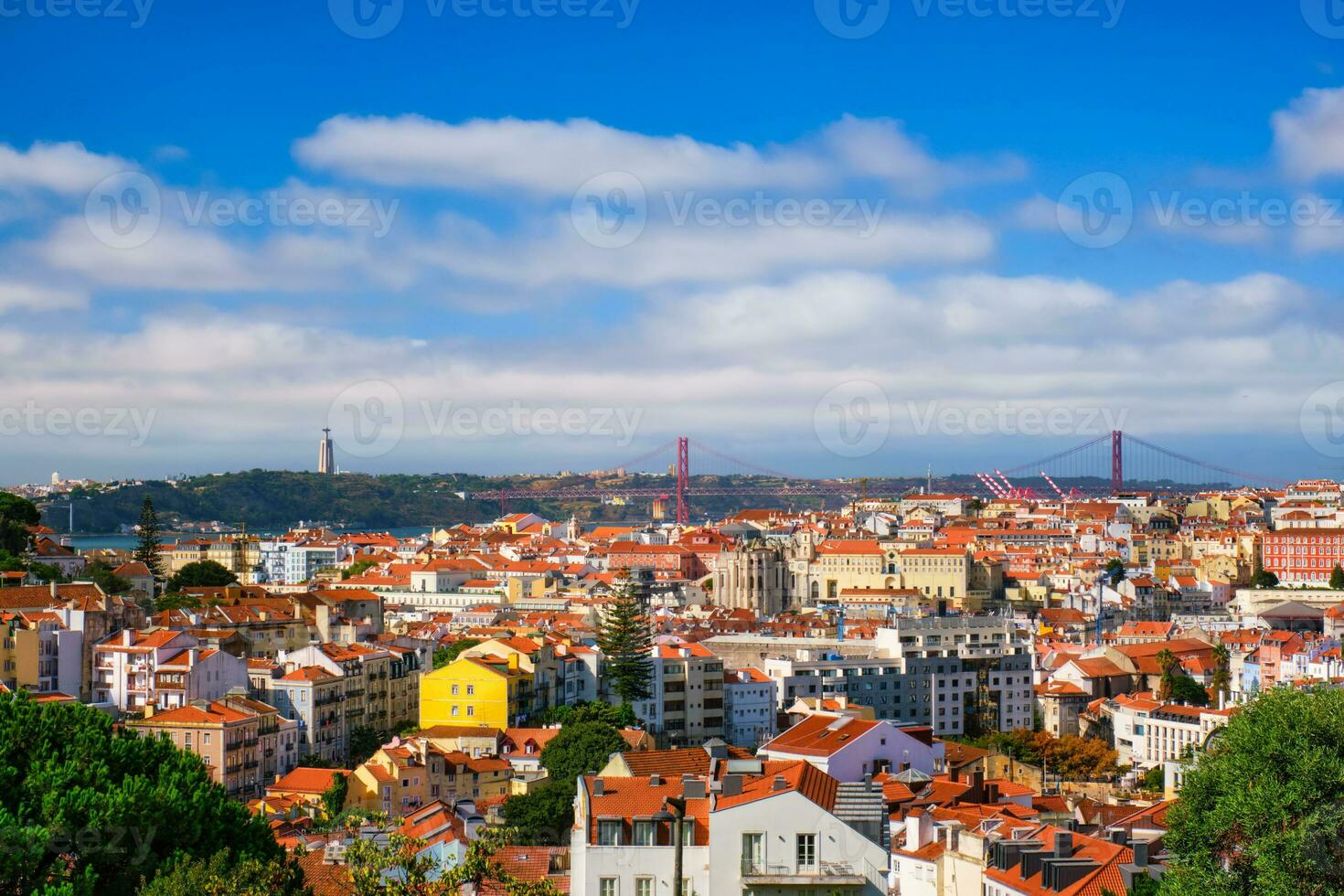 View of Lisbon from Miradouro dos Barros viewpoint with clouds. Lisbon, Portugal photo