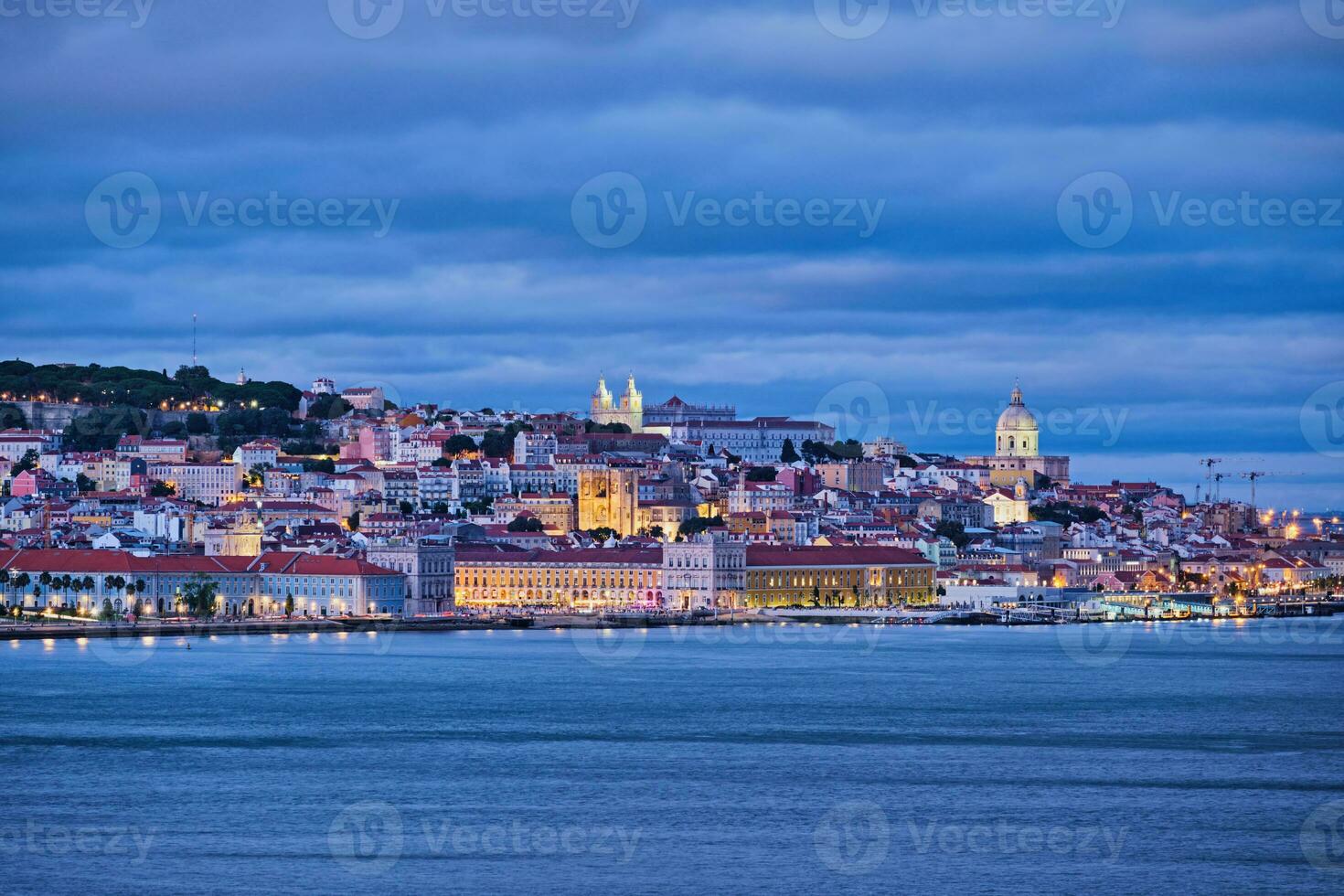 View of Lisbon view over Tagus river with yachts and boats in the evening. Lisbon, Portugal photo