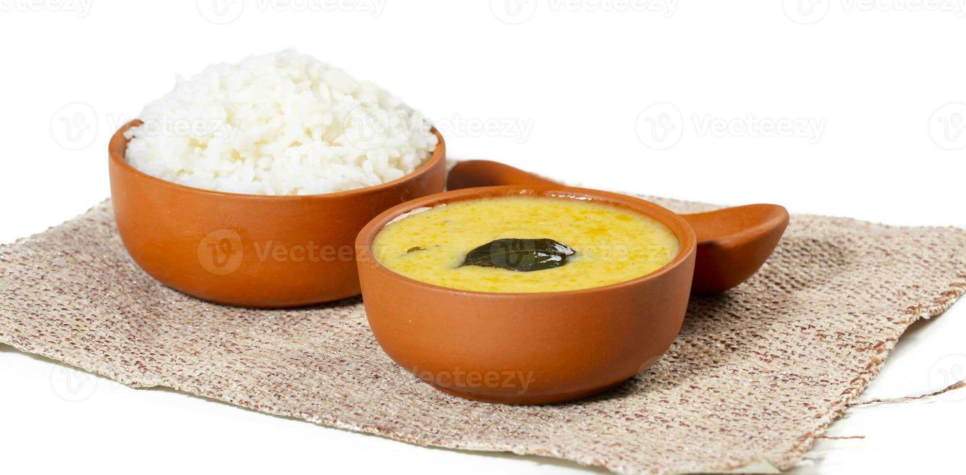 Indian Traditional Cuisine Kadhi Chawal Also Know as Curry Chawal, Yogurt Curry with Rice on White Background photo