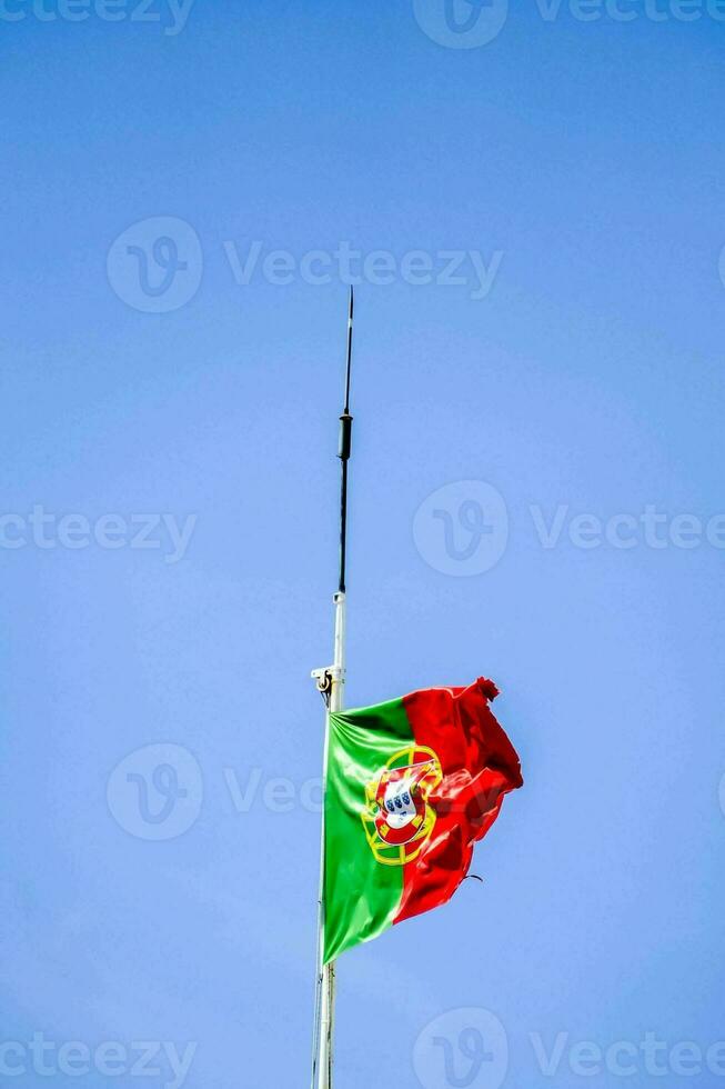 portugal flag on the flagpole photo