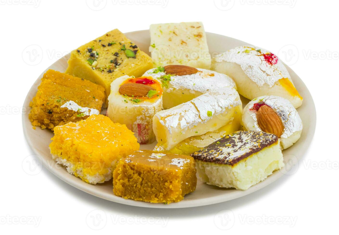 Indian Delicious Mix Sweet Food or Mix Mithai on White Background photo