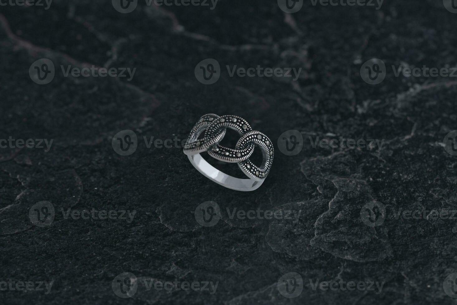 Silver Ring Indian jewellery also know as jewellery, jewel or jewellery on dark background photo