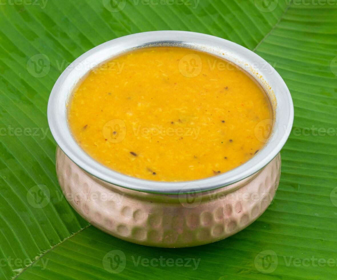 Indian Traditional Cuisine Dal Fry on Banana Leaf photo