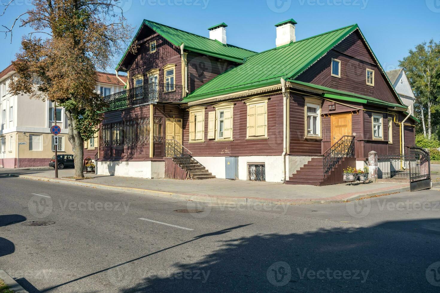 hundred-year-old historical old wooden building and homestead of private sector in wooden constructivism style photo