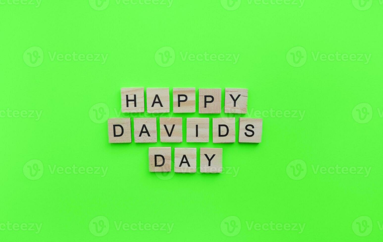 On March 1, happy St. Davids day, a minimalistic banner with an inscription in wooden letters photo