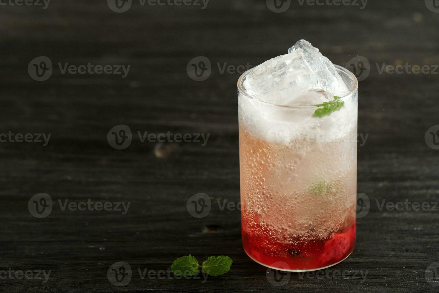 Refreshing Spritzer with Red Syrup, Sparkling Water with Ice photo