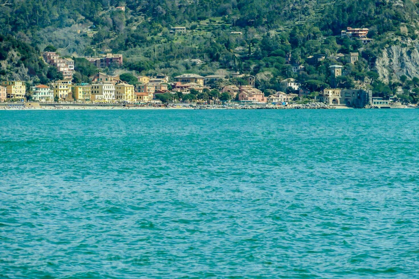 a view of the town of castel di cinque from the water photo