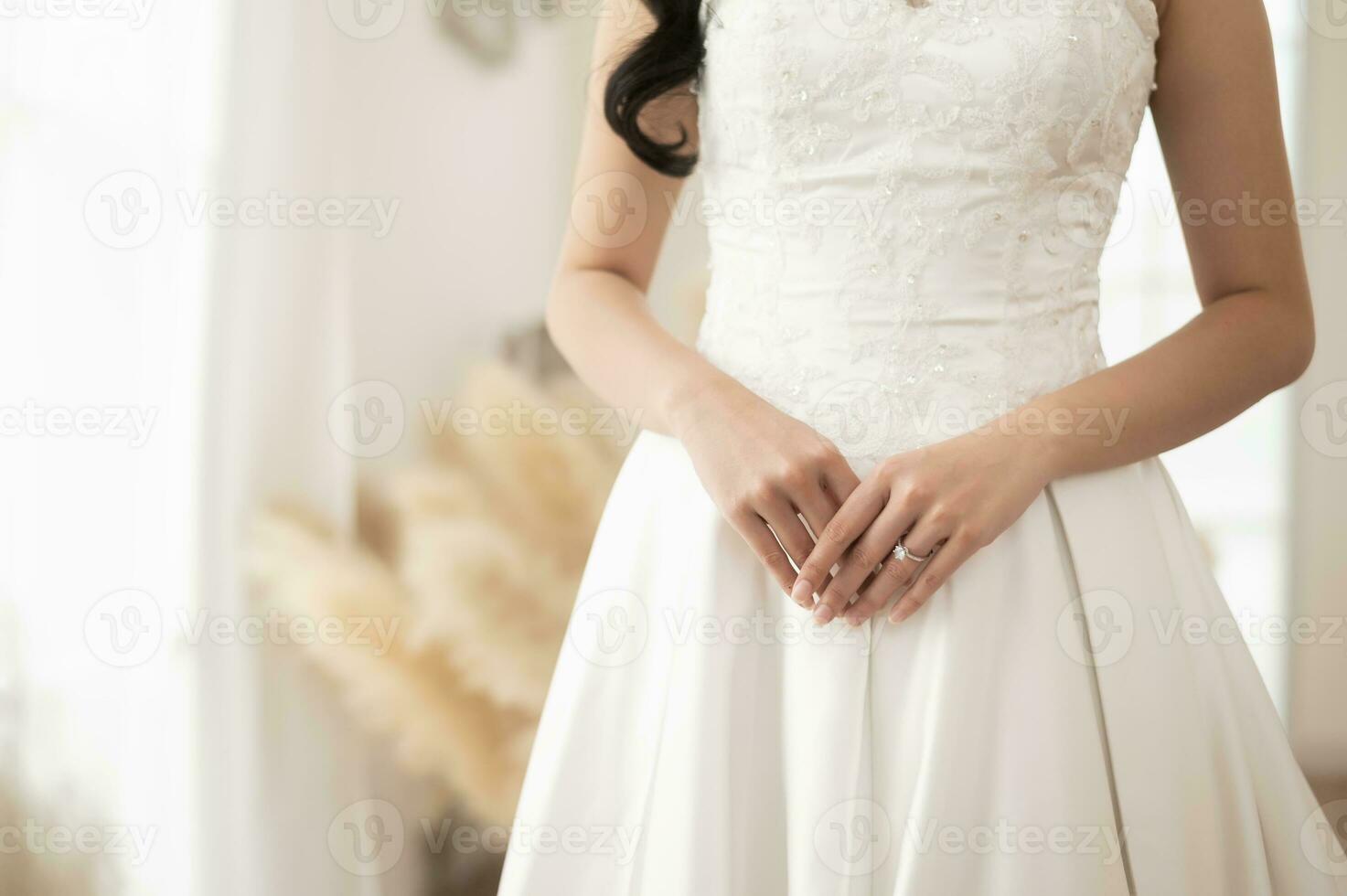 Close up of elegant wedding ring on the bride's finger, Love and marriage concept photo