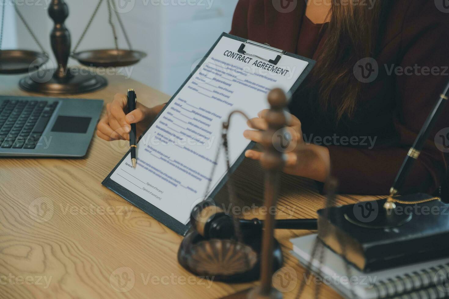 Lawyer, legal advisor, businessman brainstorming information on agreement details Business contracts in legal processing books for accuracy in contract documents. joint financial investment. photo
