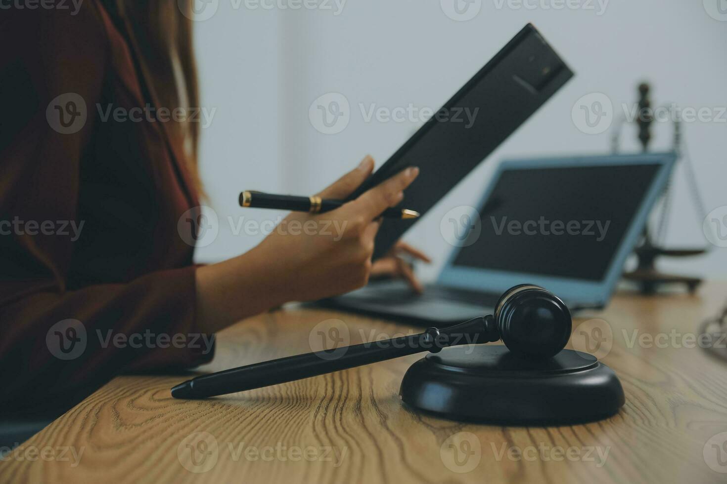 Lawyer, legal advisor, businessman brainstorming information on agreement details Business contracts in legal processing books for accuracy in contract documents. joint financial investment. photo