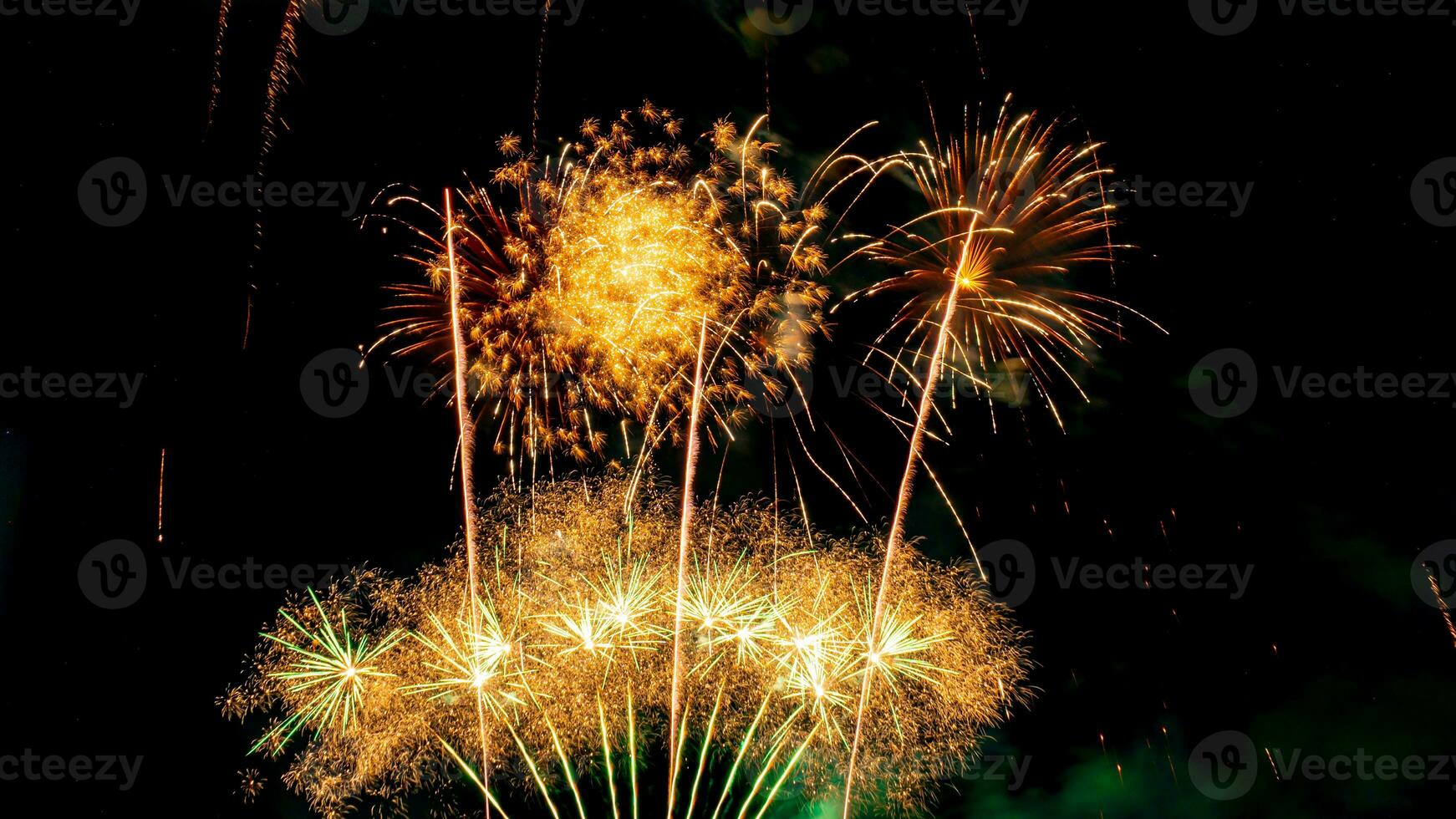 fireworks on the river in the dark sky photo