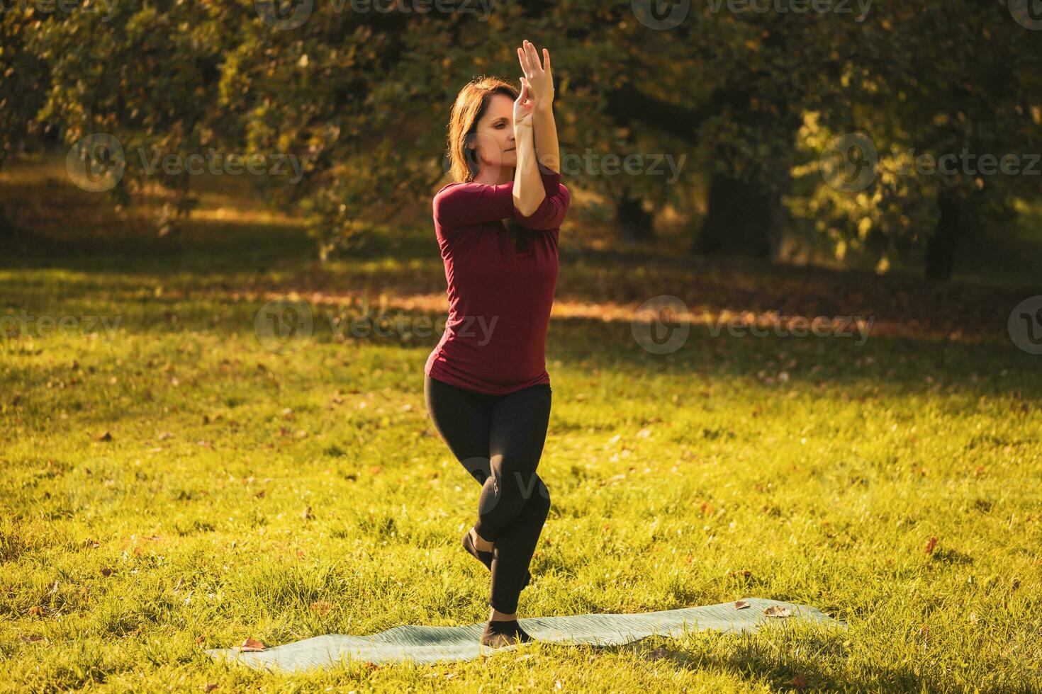 Beautiful woman doing yoga in the nature, photo